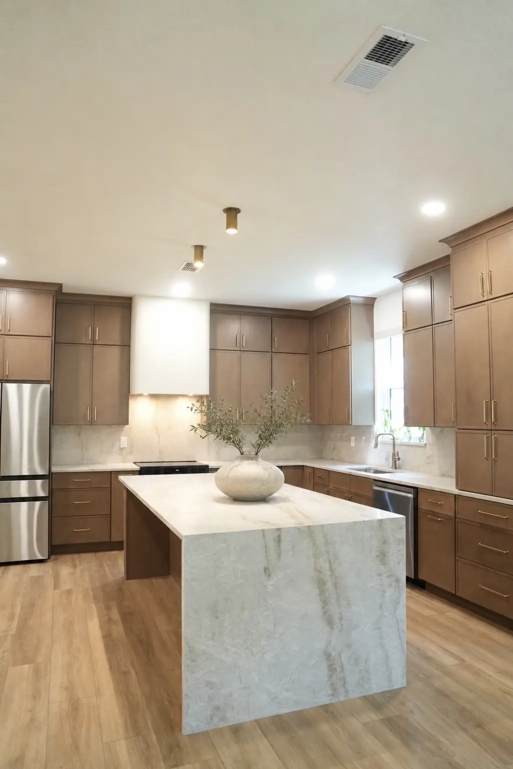 Warm walnut kitchen designed and remodeled by CFN